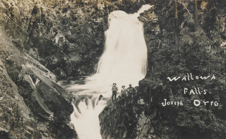 Men posing in front of Wallowa Falls