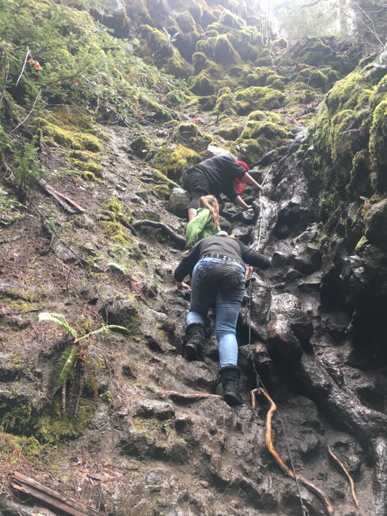 Climbing along the trail to the base of Toketee falls, Oregon